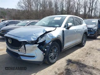 2020 Mazda CX-5 Touring with VIN JM3KFBCM3L0791816, listed as a IAAI auction lot 41761623 with 87,742 mi miles and . Bid and sale history available at carsss.com. Image 17.