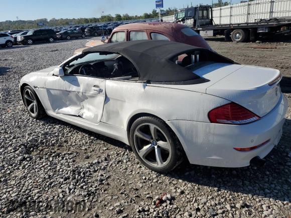 2010 BMW 6 Series 650i z VIN WBAEB5C50AC224807, wystawiony jako Copart lot #73411584 z przebiegiem 112 734 mil mil oraz Szkoda całkowita • Salvage title. Historia ofert i sprzedaży dostępna na DreamBid. Obrazek 2.