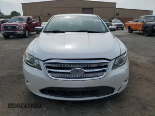 2010 Ford Taurus Limited with VIN 1FAHP2FW4AG144445, listed as a Copart auction lot 56878295 with 148,439 mi miles and Salvage title. Bid and sale history available at DreamBid. Image 5.