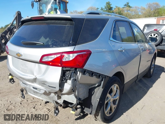 2018 Chevrolet Equinox Premier with VIN 3GNAXVEV4JS598239, listed as a IAAI auction lot 42112886 with 142,093 mi miles and . Bid and sale history available at DreamBid. Image 4.