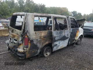 2001 Chevrolet Astro with VIN 1GNDM19W41B133828, listed as a Copart auction lot 71956404 with Not Provided miles and Salvage Title. Bid and sale history available at carsss.com. Image 3.
