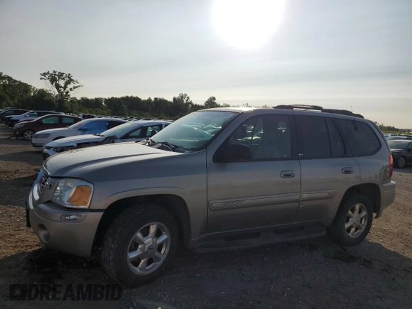 2002 GMC Envoy SLT with VIN 1GKDT13S322420861, listed as a Copart auction lot 63408164 with 250,167 mi miles and Salvage Title. Bid and sale history available at DreamBid. Image 1.