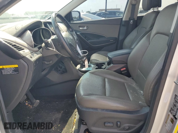 2013 Hyundai Santa Fe Sport z VIN 5XYZUDLA2DG069389, wystawiony jako Copart lot #64054684 z przebiegiem 162 861 mil mil oraz Szkoda całkowita • Salvage title. Historia ofert i sprzedaży dostępna na DreamBid. Obrazek 7.