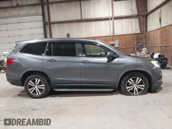 2016 Honda Pilot EX-L with VIN 5FNYF6H5XGB010230, listed as a IAAI auction lot 41858811 with 194,119 mi miles. Bid and sale history available at carsss.com. Image 13.