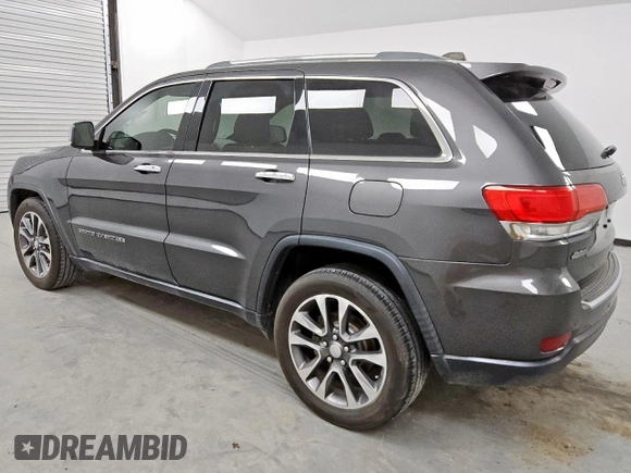 2018 Jeep Grand Cherokee Limited z VIN 1C4RJEBG3JC340061, wystawiony jako Copart lot #56654975 z przebiegiem 151 443 mil mil oraz Czysty tytuł • Clean title. Historia ofert i sprzedaży dostępna na DreamBid. Obrazek 2.