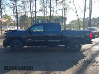 2015 Chevrolet Silverado 1500 LTZ with VIN 3GCUKSEC0FG497341, listed as a IAAI auction lot 41829608 with 96,805 mi miles. Bid and sale history available at carsss.com. Image 14.