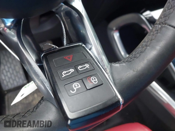 2020 Jaguar I-Pace SE with VIN SADHC2S14L1F80256, listed as a IAAI auction lot 42055674 with 48,694 mi miles and . Bid and sale history available at DreamBid. Image 11.