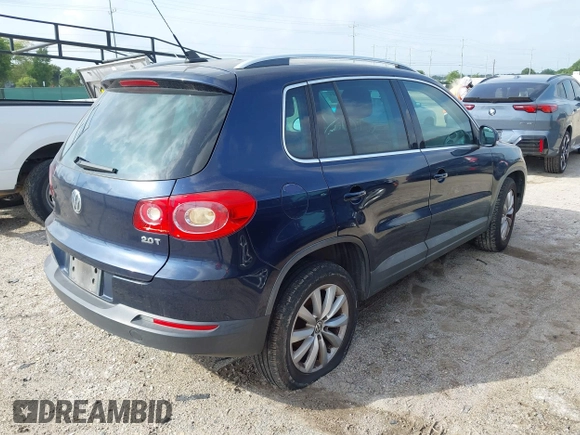 2011 Volkswagen Tiguan SE with VIN WVGAV7AX7BW530357, listed as a IAAI auction lot 42740821 with 170,636 mi miles and . Bid and sale history available at DreamBid. Image 4.
