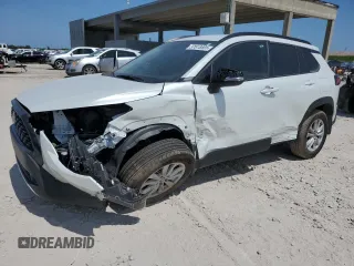 2024 Toyota Corolla Cross LE with VIN 7MUCAAAG7RV090677, listed as a Copart auction lot 57615565 with 6,910 mi miles and Salvage title. Bid and sale history available at DreamBid. Image 1.