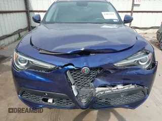 2019 Alfa Romeo Stelvio z VIN ZASPAKAN0K7C44623, wystawiony jako IAAI lot #42062414 z przebiegiem 68 722 mil mil oraz . Historia ofert i sprzedaży dostępna na DreamBid. Obrazek 6.