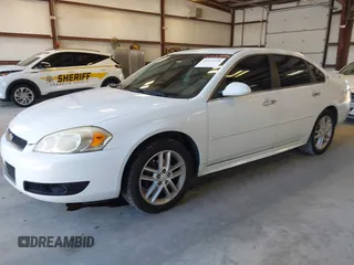 2013 Chevrolet Impala LTZ z VIN 2G1WC5E30D1126217, wystawiony jako IAAI lot #40323994 z przebiegiem 111 457 mil mil oraz . Historia ofert i sprzedaży dostępna na DreamBid. Obrazek 2.