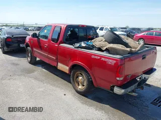 2001 Ford F-150 XL with VIN 1FTRX18L91NB88500, listed as a IAAI auction lot 42096189 with Not provided miles and . Bid and sale history available at DreamBid. Image 3.
