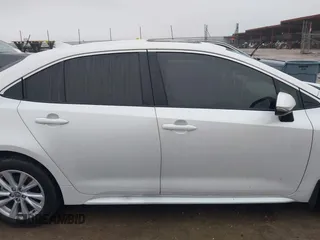 2024 Toyota Corolla Hybrid LE with VIN JTDBCMFE4RJ027221, listed as a IAAI auction lot 41084897 with 10,683 mi miles. Bid and sale history available at carsss.com. Image 13.
