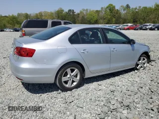 2012 Volkswagen Jetta TDI w/Premium & Nav с VIN 3VWLL7AJ4CM426910, выставлен на аукционе Copart как лот 53111065 с пробегом 137 376 миль миль и Списание • Salvage title. История ставок и продаж доступна на DreamBid. Изображение 3.