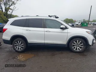 2020 Honda Pilot EX z VIN 5FNYF6H36LB027308, wystawiony jako IAAI lot #42216410 z przebiegiem 97 303 mil mil oraz . Historia ofert i sprzedaży dostępna na DreamBid. Obrazek 13.