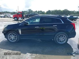 2014 Cadillac SRX Performance Collection с VIN 3GYFNFE38ES656510, выставлен на аукционе IAAI как лот 42336472 с пробегом 125 269 миль миль и . История ставок и продаж доступна на DreamBid. Изображение 14.