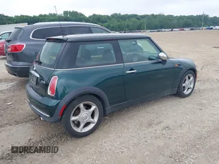 2006 MINI Hardtop with VIN WMWRC33566TK67977, listed as a IAAI auction lot 42538539 with 121,650 mi miles and . Bid and sale history available at DreamBid. Image 4.