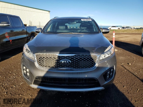2016 Kia Sorento SXL z VIN 5XYPKDA15GG105354, wystawiony jako Copart lot #79710674 z przebiegiem 167 327 mil mil oraz Czysty tytuł • Clean title. Historia ofert i sprzedaży dostępna na DreamBid. Obrazek 5.