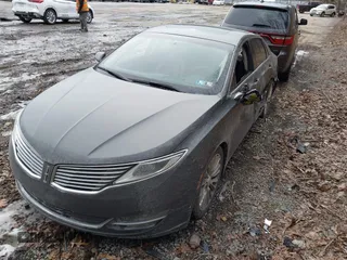 2015 Lincoln MKZ with VIN 3LN6L2J97FR616714, listed as a IAAI auction lot 41664184 with 116,495 mi miles and . Bid and sale history available at DreamBid. Image 17.