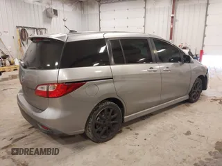 2012 Mazda 5 Touring z VIN JM1CW2CL1C0107706, wystawiony jako IAAI lot #41551479 z przebiegiem 123 418 mil mil oraz . Historia ofert i sprzedaży dostępna na DreamBid. Obrazek 4.