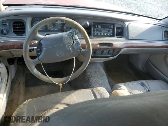 1997 Mercury Grand Marquis GS z VIN 2MELM74W1VX611803, wystawiony jako Copart lot #54315505 z przebiegiem 156 152 mil mil oraz Szkoda całkowita • Salvage title. Historia ofert i sprzedaży dostępna na DreamBid. Obrazek 8.