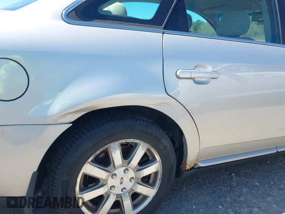 2008 Ford Taurus SEL with VIN 1FAHP24W18G115823, listed as a IAAI auction lot 42119435 with 57,867 mi miles. Bid and sale history available at carsss.com. Image 6.
