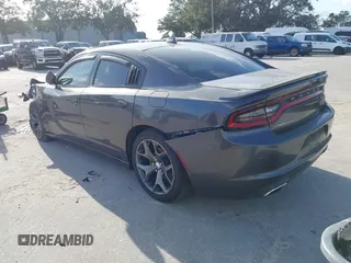 2015 Dodge Charger RT with VIN 2C3CDXCT9FH819971, listed as a IAAI auction lot 40592010 with 154,386 mi miles and . Bid and sale history available at DreamBid. Image 3.