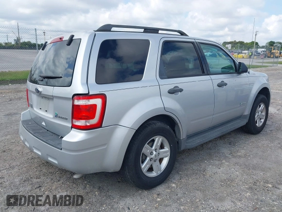2011 Ford Escape Hybrid with VIN 1FMCU4K3XBKC60103, listed as a IAAI auction lot 42048614 with 125,354 mi miles and . Bid and sale history available at DreamBid. Image 4.