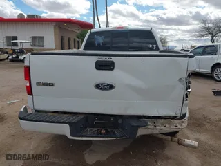 2005 Ford F-150 XL with VIN 1FTRF12W05NB36068, listed as a IAAI auction lot 41732744 with 203,261 mi miles. Bid and sale history available at carsss.com. Image 16.