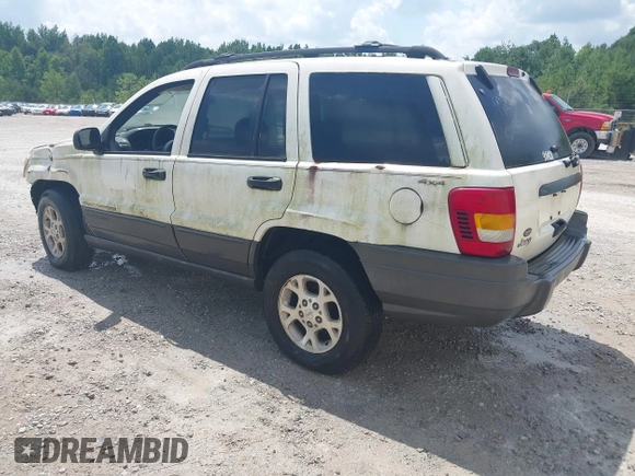 2001 Jeep Grand Cherokee Laredo with VIN 1J4GW48S81C520385, listed as a IAAI auction lot 42790086 with 190,617 mi miles and . Bid and sale history available at DreamBid. Image 3.