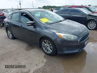 2017 Ford Focus SE with VIN 1FADP3F23HL232809, listed as a IAAI auction lot 42117700 with 104,802 mi miles and . Bid and sale history available at DreamBid. Image 1.