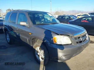 2005 Mazda Tribute S with VIN 4F2CZ94145KM17398, listed as a IAAI auction lot 41275022 with 42,465 mi miles and . Bid and sale history available at DreamBid. Image 1.