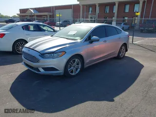 2018 Ford Fusion SE with VIN 3FA6P0H72JR117545, listed as a IAAI auction lot 42012543 with 147,214 mi miles. Bid and sale history available at carsss.com. Image 18.