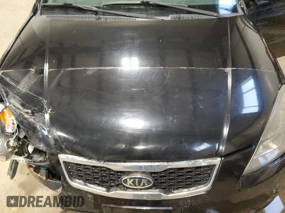2010 Kia Rio with VIN KNADH4B37A6641845, listed as a Copart auction lot 51861215 with 163,894 mi miles and Salvage Title. Bid and sale history available at DreamBid. Image 11.
