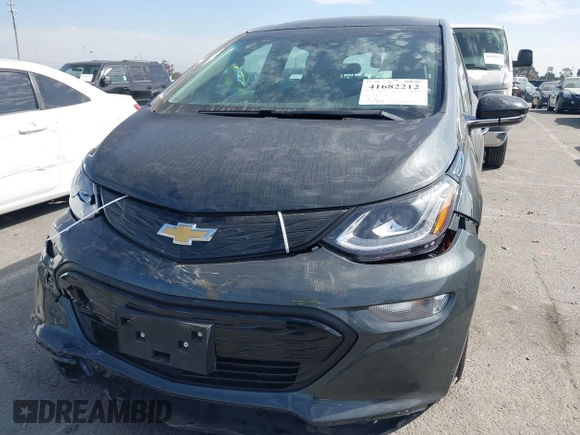 2020 Chevrolet Bolt EV LT z VIN 1G1FY6S0XL4108666, wystawiony jako IAAI lot #41682212 z przebiegiem 34 387 mil mil oraz . Historia ofert i sprzedaży dostępna na DreamBid. Obrazek 6.