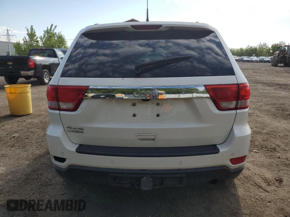 2011 Jeep Grand Cherokee Laredo z VIN 1J4RR4GG1BC506083, wystawiony jako Copart lot #58498295 z przebiegiem 122 847 mil mil oraz Czysty tytuł • Clean title. Historia ofert i sprzedaży dostępna na DreamBid. Obrazek 6.