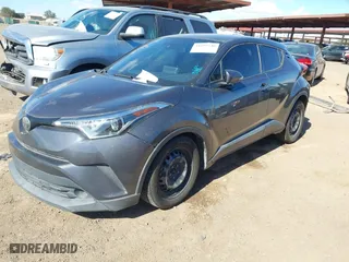 2019 Toyota C-HR XLE with VIN JTNKHMBX9K1049421, listed as a IAAI auction lot 41699240 with 128,911 mi miles. Bid and sale history available at carsss.com. Image 18.