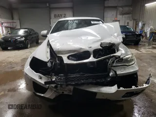 2013 BMW X6 xDrive50i z VIN 5UXFG8C53DL591536, wystawiony jako Copart lot #82219394 z przebiegiem 191 439 mil mil oraz Szkoda całkowita • Salvage title. Historia ofert i sprzedaży dostępna na DreamBid. Obrazek 5.