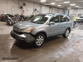 2009 Honda CR-V EX-L with VIN 5J6RE48739L037292, listed as a IAAI auction lot 41121290 with 150,597 mi miles. Bid and sale history available at carsss.com. Image 17.