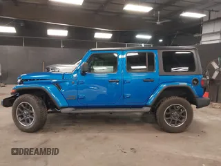 2021 Jeep Wrangler Unlimited Sport S with VIN 1C4HJXDN5MW717673, listed as a IAAI auction lot 42210527 with 35,635 mi miles and . Bid and sale history available at DreamBid. Image 14.