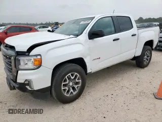 2022 GMC Canyon 4WD AT4 z VIN 1GTG6FEN2N1210072, wystawiony jako Copart lot #57084565 z przebiegiem 64 897 mil mil oraz Szkoda całkowita • Salvage title. Historia ofert i sprzedaży dostępna na DreamBid. Obrazek 1.