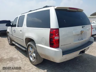 2011 Chevrolet Suburban LTZ with VIN 1GNSCKE06BR207874, listed as a IAAI auction lot 41903805 with 288,007 mi miles. Bid and sale history available at carsss.com. Image 3.