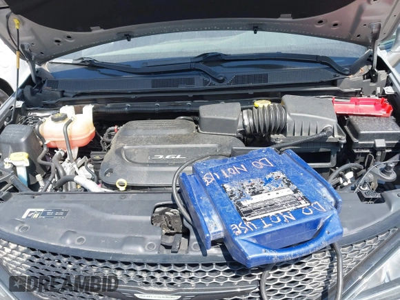 2018 Chrysler Pacifica Touring L with VIN 2C4RC1BG5JR165418, listed as a IAAI auction lot 42143241 with 157,768 mi miles and . Bid and sale history available at DreamBid. Image 10.