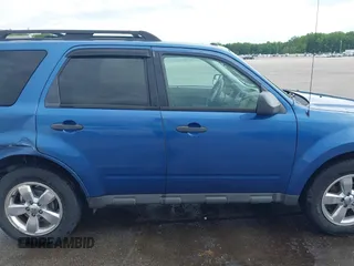 2010 Ford Escape XLT z VIN 1FMCU0D79AKC48435, wystawiony jako IAAI lot #42230904 z przebiegiem 137 530 mil mil oraz . Historia ofert i sprzedaży dostępna na DreamBid. Obrazek 13.