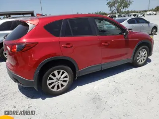 2016 Mazda CX-5 Sport with VIN JM3KE2BY1G0634797, listed as a Copart auction lot 54572155 with 170,164 mi miles and Clean Title. Bid and sale history available at carsss.com. Image 3.