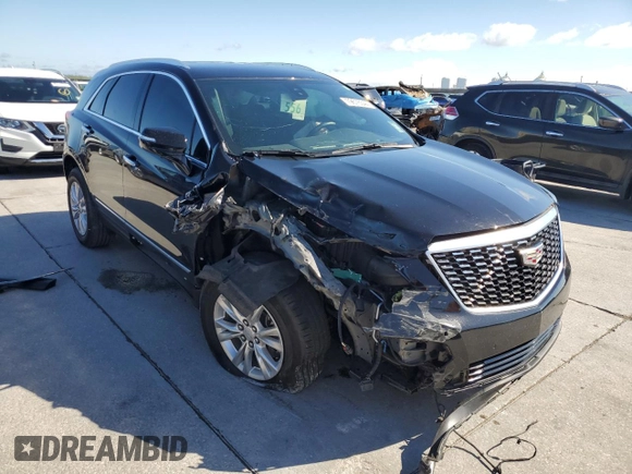 2022 Cadillac XT5 FWD Luxury with VIN 1GYKNAR45NZ118872, listed as a Copart auction lot 79676544 with 31,467 mi miles and Salvage title. Bid and sale history available at DreamBid. Image 4.