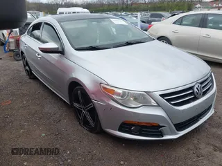 2009 Volkswagen CC Sport with VIN WVWEU73C99E557501, listed as a IAAI auction lot 41842303 with 203,114 mi miles and . Bid and sale history available at DreamBid. Image 1.