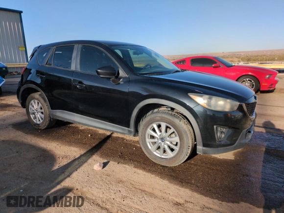 2015 Mazda CX-5 Touring with VIN JM3KE4CY3F0435422, listed as a Copart auction lot 51835575 with 185,727 mi miles and Salvage Title. Bid and sale history available at DreamBid. Image 4.
