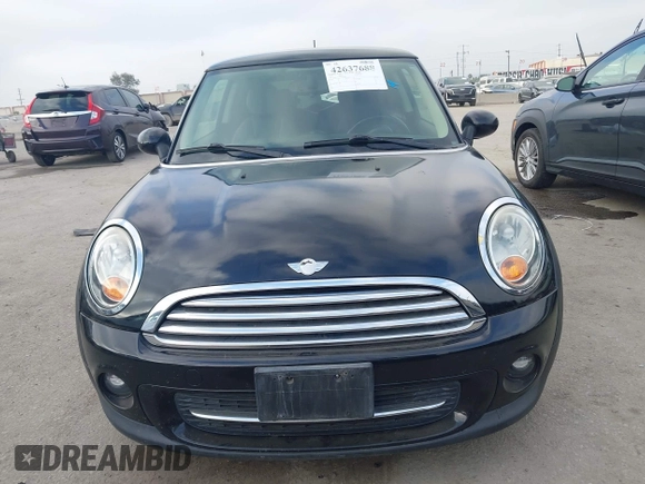 2011 MINI Hardtop with VIN WMWSU3C50BT098905, listed as a IAAI auction lot 42637688 with 118,389 mi miles and . Bid and sale history available at DreamBid. Image 12.