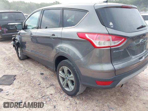 2013 Ford Escape SE with VIN 1FMCU0G96DUC26799, listed as a IAAI auction lot 42751599 with 116,312 mi miles and . Bid and sale history available at DreamBid. Image 3.